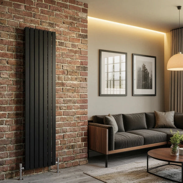 Elegant Flatty Black Vertical Panel Radiator in a living room with exposed brick wall