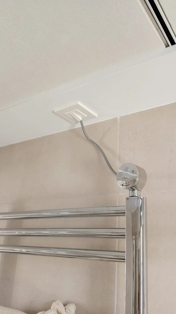 Electric towel rail with heating element wrongly fitted at the top