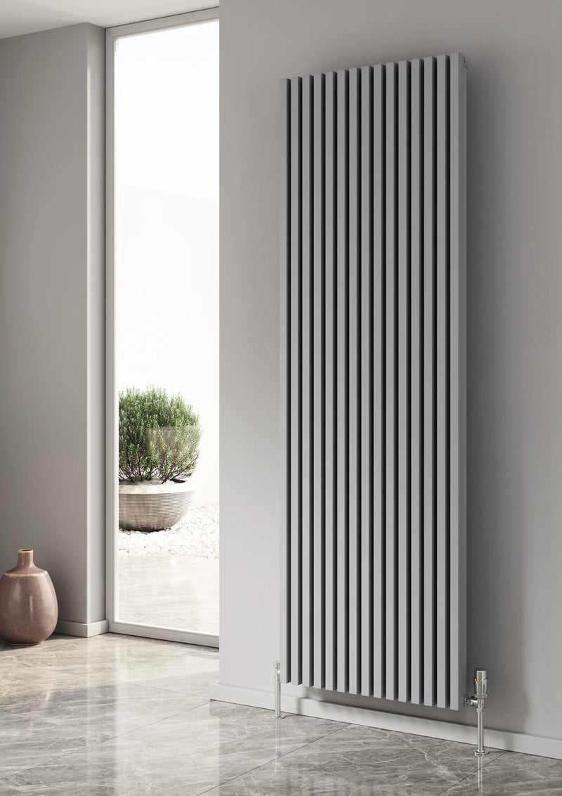 Reina Albano 1800 x 590mm silver aluminium vertical radiator in a living room